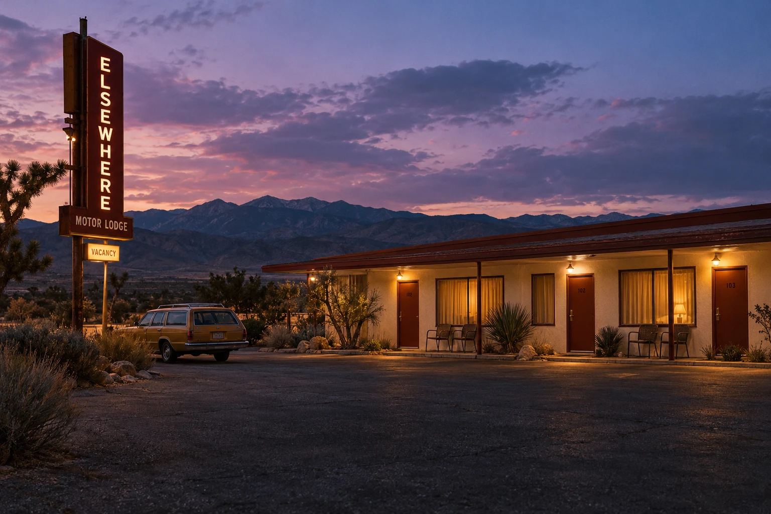 A warmly lit desert motor lodge beneath a lavender dusk sky